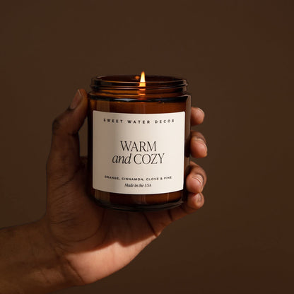 Sweet Water Decor Warm and Cozy Soy Candle - Orange Peel, Cinnamon, Ginger and Clove Scented Candles for Home - 9oz Amber Jar + Black Lid, 40+ Hour Burn Time, Made in The USA