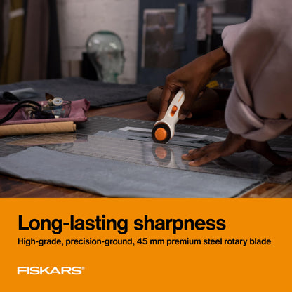 Fiskars 45mm Rotary Cutter for Fabric, Premium Steel Stick Fabric Cutter Cuts Through Multiple Layers, Right and Left Handed, Easy and Safe Blade Change, Arts and Crafts, Sewing and Quilting Tools