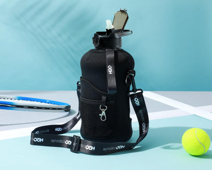 H2O Capsule 2.2L Half Gallon Water Bottle with Storage Sleeve and Removable Straw – BPA Free Large Reusable Drink Container with Handle - Big Sports Jug, 2.2 Liter (74 Ounce), Jet Black