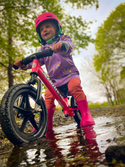 Strider 12” Sport Bike, Pink - No Pedal Balance Bicycle for Kids 1 to 4 Years - Includes Safety Pad, Padded Seat, Mini Grips & Flat-Free Tires - Tool-Free Assembly & Adjustments